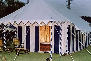 white & blue swiss cottage tent