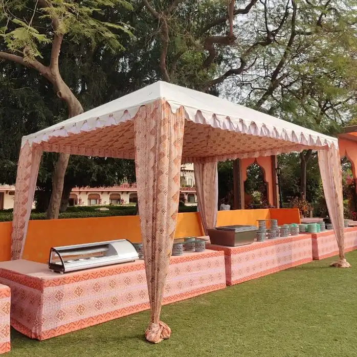 More space. More possibilities.
Designed for elongated spaces and larger gatherings, our rectangular canopies offer generous coverage while retaining the refined character of traditional Indian tent design. Our craftsmanship is rooted in years of experience, with every detail carefully finished for durability and visual appeal.
The structure can be tailored to your requirements with custom dimensions, colours, fabrics, prints, and decorative elements, making each canopy uniquely yours.