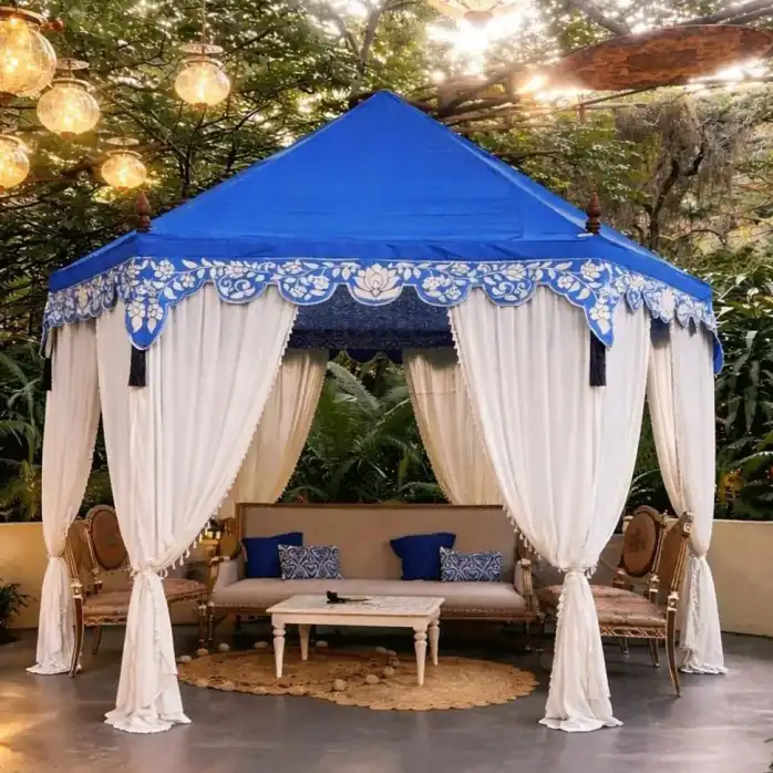 Distinctive geometry. Crafted with character.
Our hexagonal canopies bring a more distinctive architectural form to outdoor celebrations. Inspired by the richness of traditional tent structures, they are handcrafted with attention to proportion, finish, and detail.
Built with quality materials selected for outdoor use, these canopies can be customised with bespoke fabrics, colours, prints, and decorative finishes to create a truly individual setting.